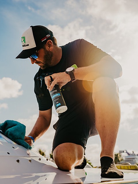 Stephen Kidahl, MDSC pro staff, wiping down a hull with Starke