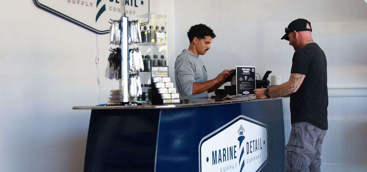 MDSC staff helping a customer at the Cape Coral store counter